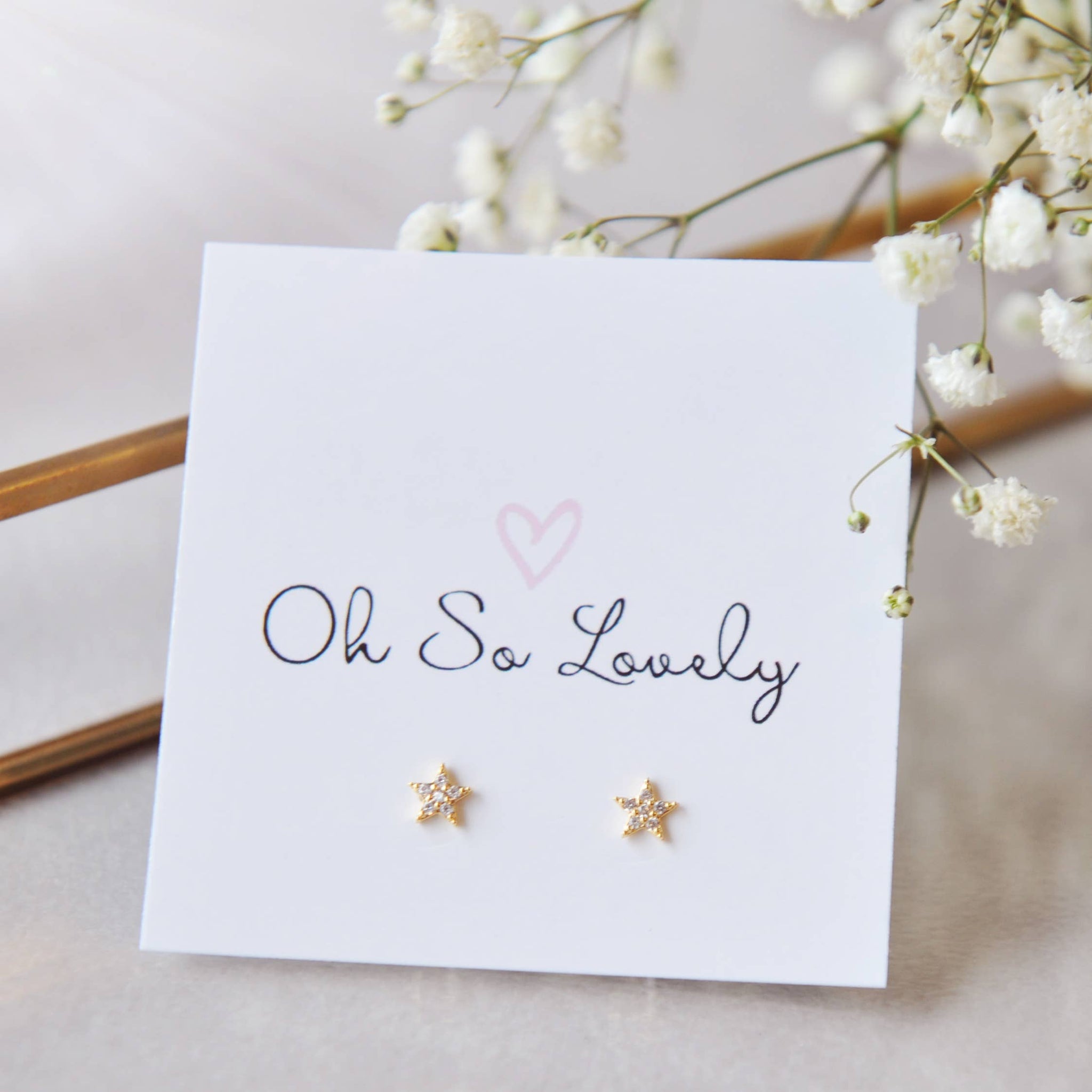 OH SO LOVELY Cubic zirconia star stud earrings